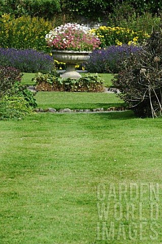 Lawn_and_flower_container_at_Malleny_Garden_Scotland