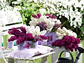 LILAC BLOSSOMS IN METAL POTS