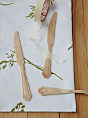 WOODEN CUTLERY PAINTED GREEN, BOTANICAL TABLE PROJECT TAPED DOWN READY FOR PAINTING