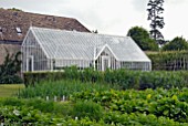 THE GLASSHOUSE IN THE VEGETABLE GARDEN AT OZLEWORTH PARK, GLOUCESTERSHIRE