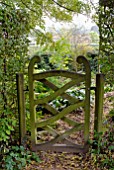 WOODEN GATE IN OZLEWORTH PARK, GLOUCESTERSHIRE