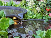 BACCHUS GARDEN  DESIGNED BY JEAN WARDROP (WARDROP DESIGNS) SILVER MEDAL WINNER WITH A THREE TIER WATER FEATURE AND GRAPE VINES.