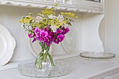 VASE CONTAINING WILD FLOWERS, WILD SWEET PEA, ACHILLEA GRANDIFLORA,  DILL