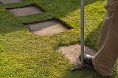 TRIMMING LAWN EDGING AROUND PAVING STONE PATH WITH HALF MOON STEP EDGER TOOL