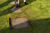 TRIMMING LAWN EDGING AROUND PAVING STONE PATH WITH HALF MOON STEP EDGER TOOL