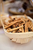 CINNAMON STICKS IN A TRUG