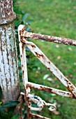 RUSTY METAL GARDEN GATE AND POST