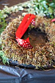 WREATH WITH SPOTTY RED AND WHITE RIBBON