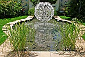 GLASS FISH FOUNTAIN ,  POOL IN SMALL GARDEN