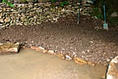 BUILDING BOGGY AREA (BOG GARDEN) BACK FILL,  WATER TURNING CLOUDY