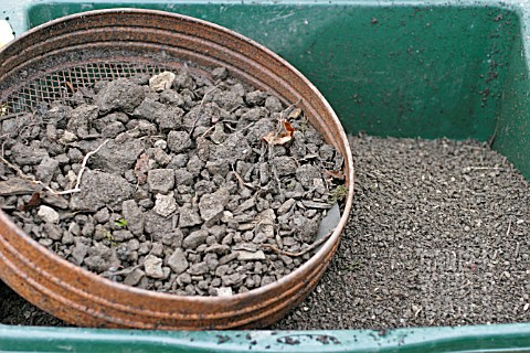 SIEVING_SOIL_TO_MAKE_A_POTTING_MIX