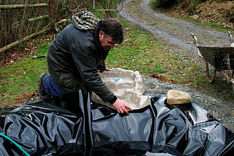 BUILDING_POOL__PUT_WATERFALL_SECTION_IN_POSITION