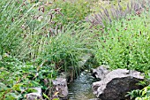 GARDEN SCENE WITH STREAM