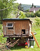 Hen house on wheels in a garden