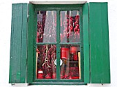 Dried peppers through a window, Hondarribia (Basque Country).