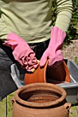 Cleaning of pots in a garden