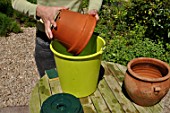 Cleaning of pots in a garden