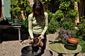 Cleaning of pots in a garden