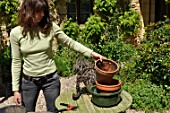 Cleaning of pots in a garden