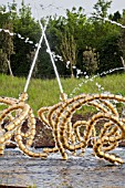 Jets of water and sculptures at Bosquet du theatre deau, Gardens of Versailles, France. Garden design : Louis Benech, artist : Jean Michel Othoniel