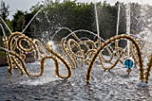 Jets of water and sculptures at Bosquet du theatre deau, Gardens of Versailles, France. Garden design : Louis Benech, artist : Jean Michel Othoniel