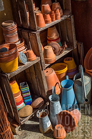 Stored_terracotta_pots_and_traditional_watering_cans_Provence_France