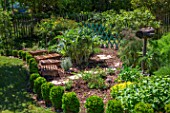 Lettuce seeding protected from the sun with trays, Vegetable Garden, Provence, France