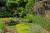 Square foot kitchen garden and tomatoes (supported), Provence, France