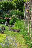 Square foot kitchen garden and tomatoes (supported), Provence, France