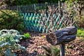 Insect hotel created from a sawn wooden log, Provence, France