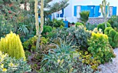 A private garden with a wide variety of Mediterranean plant species adapted to the climate of the Cyclades, kamari, Santorini, Cyclades, Greece