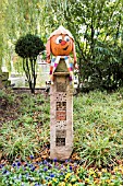 Decorated pumpkins for Halloween in an insect hotel, Germany