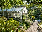 Bicycle in front of a greenhouse, Jardin Insolite, Parc Floral Vincennes, Paris, France