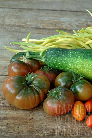 Harvest_from_the_vegetable_garden_courgette_Cucurbita_pepo_butter_beans_Phaseolus_vulgaris_tomatoes_