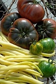 Green Zebra and Crimean Black tomatoes (Solanum lycopersicum) and butter beans (Phaseolus vulgaris)