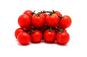 Ripe red tomatoes on a light background. Natural product.