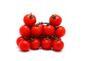 Ripe red tomatoes on a light background. Natural product.