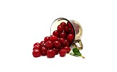 Ripe cherry in a transparent glass on a light background. Natural product. Natural color. Close-up