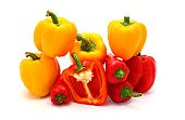 Composition of several types of sweet pepper of different shapes, colors and sizes on a light background. Natural product. Natural color. Close-up.