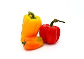 Composition of several types of sweet pepper of different shapes, colors and sizes on a light background. Natural product. Natural color. Close-up.