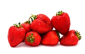 Several ripe strawberries on a light background. Natural color and shape. Close-up.