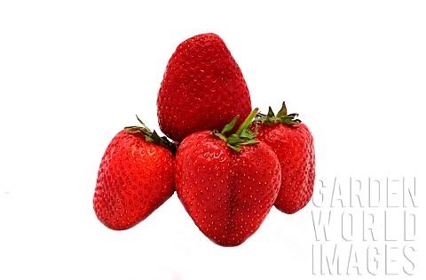 Several_ripe_strawberries_on_a_light_background_Natural_color_and_shape_Closeup