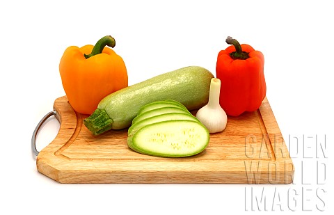 Zucchini_head_of_garlic_and_a_pair_of_ripe_yellow_and_orange_sw