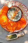 Tarragon (Artemisia dracunculus) and tomato salad, herb, benefits: health, cooking: in sauce for dishes