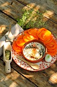 Tarragon (Artemisia dracunculus) and tomato salad, herb, benefits: health, cooking: in sauce for dishes