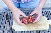 Harvesting seeds of old variety tomatoes Noire de Crimée