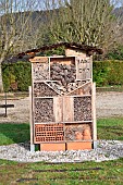 Insect hotel or insect shelter to encourage beneficial insects in the garden