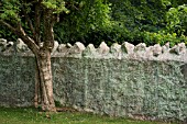 GARDEN WALL STACKED OF BOULDERS AND CLAY