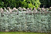 GARDEN WALL STACKED OF BOULDERS AND CLAY