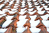 OLD PANTILE ROOF WITH SNOW